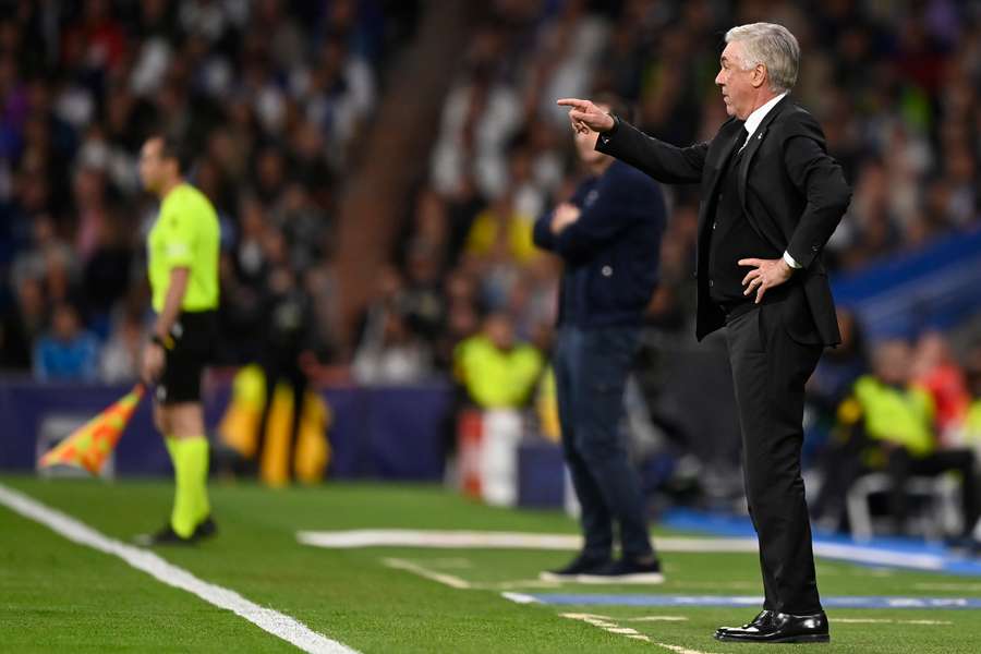 Real Madrid's Italian coach Carlo Ancelotti gestures during the UEFA Champions League quarter-final against Chelsea