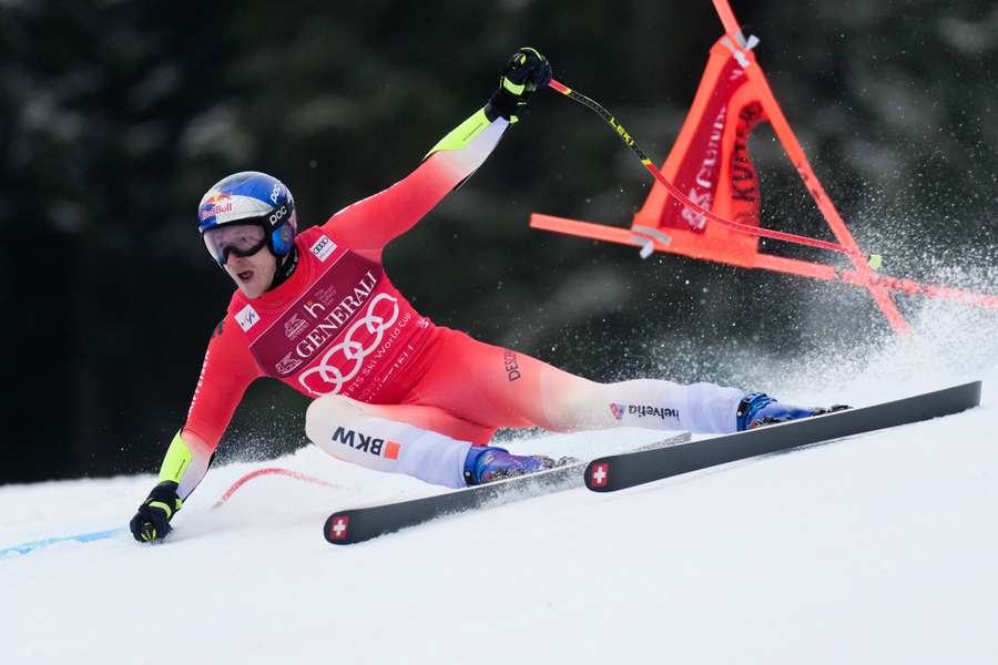 Switzerland's Marco Odermatt is only the third Alpine skier to win four overall titles in a row
