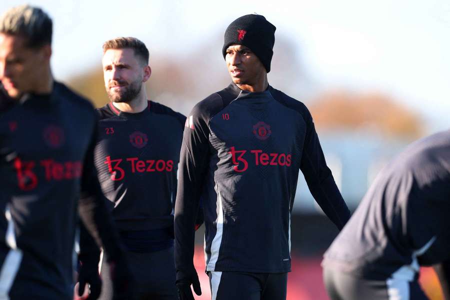 Luke Shaw (second left) has suffered another injury setback