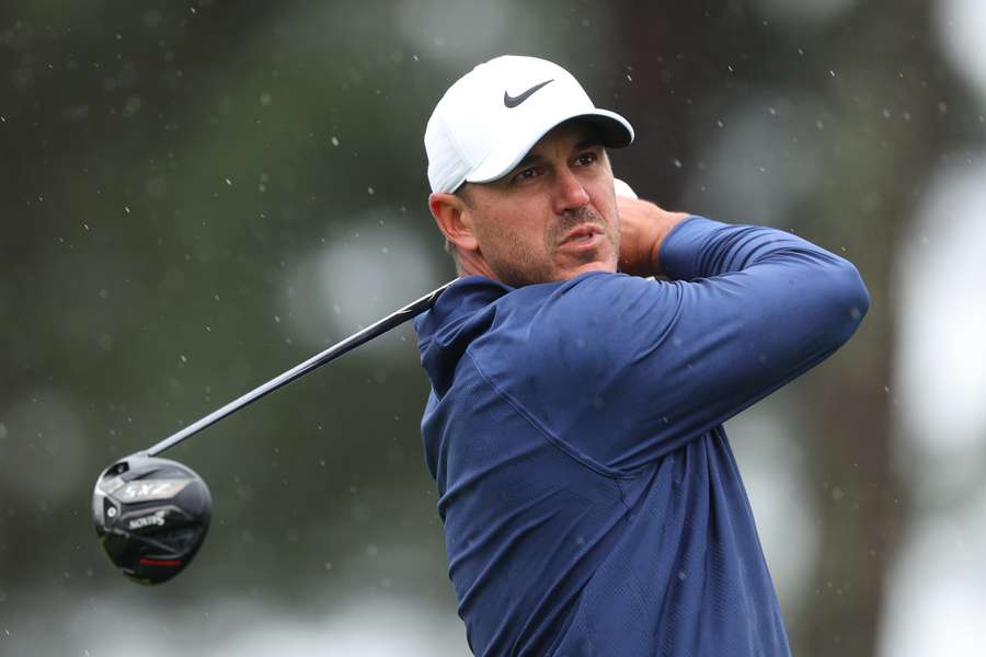 Brooks Koepka of the United States plays his shot