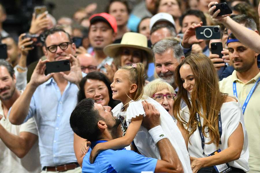 Serbia's Novak Djokovic hugs his daughter after winning the US Open tennis tournament men's singles final Serbia's Novak Djokovic hugs his daughter after winning the US Open tennis tournament men's singles final