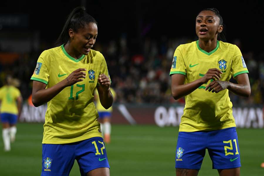 Brazil midfielder Ary Borges (L) celebrates with Kerolin