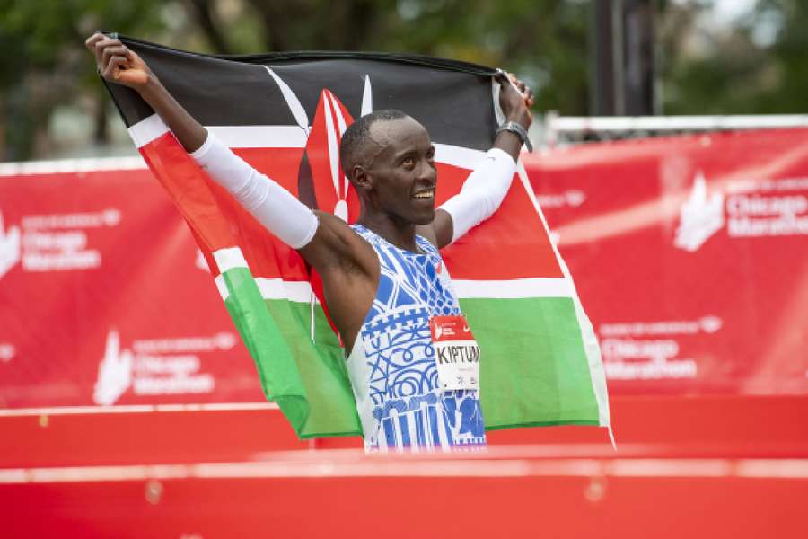 Kelvin Kiptum of Kenya celebrates after finishing in a world record time of 2:00:35 to win the Chicago Marathon at Grant Park