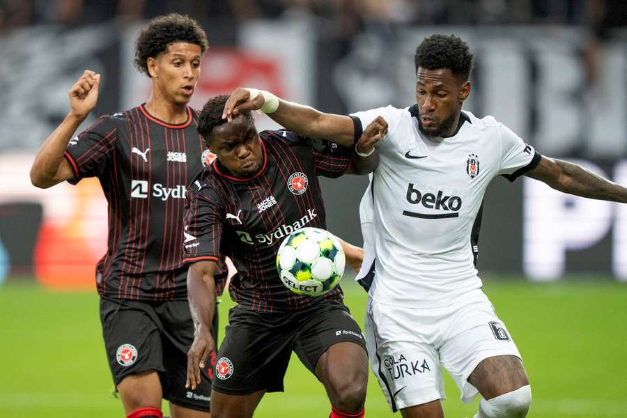 Besiktas JK's Michael Murillo in action with FC Midtjylland's Stanley Iheanacho and Julius Emefile during the Europa League clash.