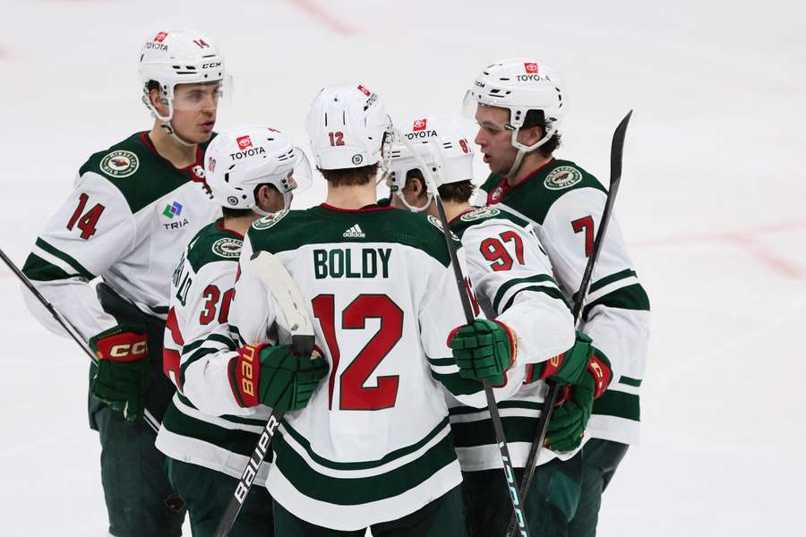 Kirill Kaprizov celebrates with Matt Boldy, Mats Zuccarello, Joel Eriksson Ek and Brock Faber after scoring against the Florida Panthers