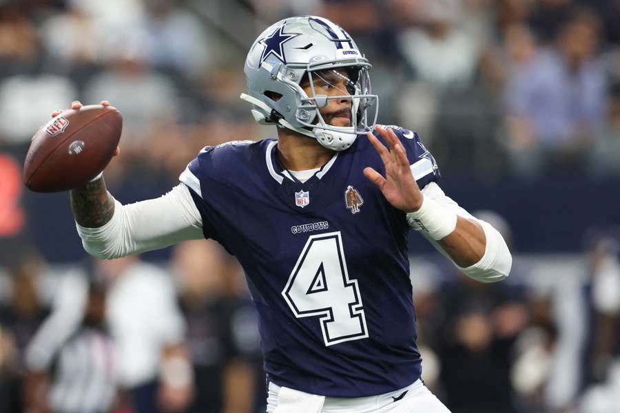 Dak Prescott throwing a pass against the Detroit Lions (2024) Dak Prescott throwing a pass against the Detroit Lions (2024)