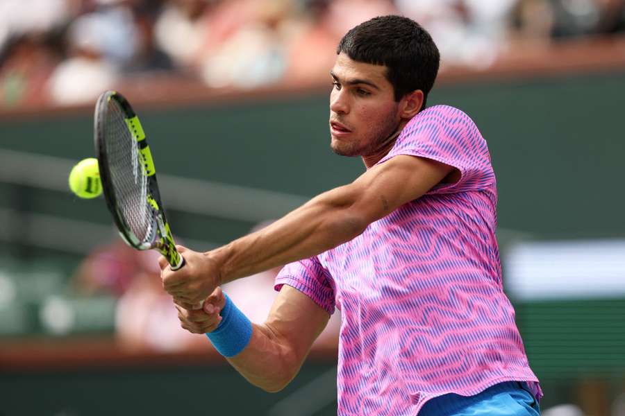 Spain's Carlos Alcaraz plays a backhand on the way to a third-round victory over Felix Auger-Aliassime of Canada at the WTA-ATP Indian Wells Masters