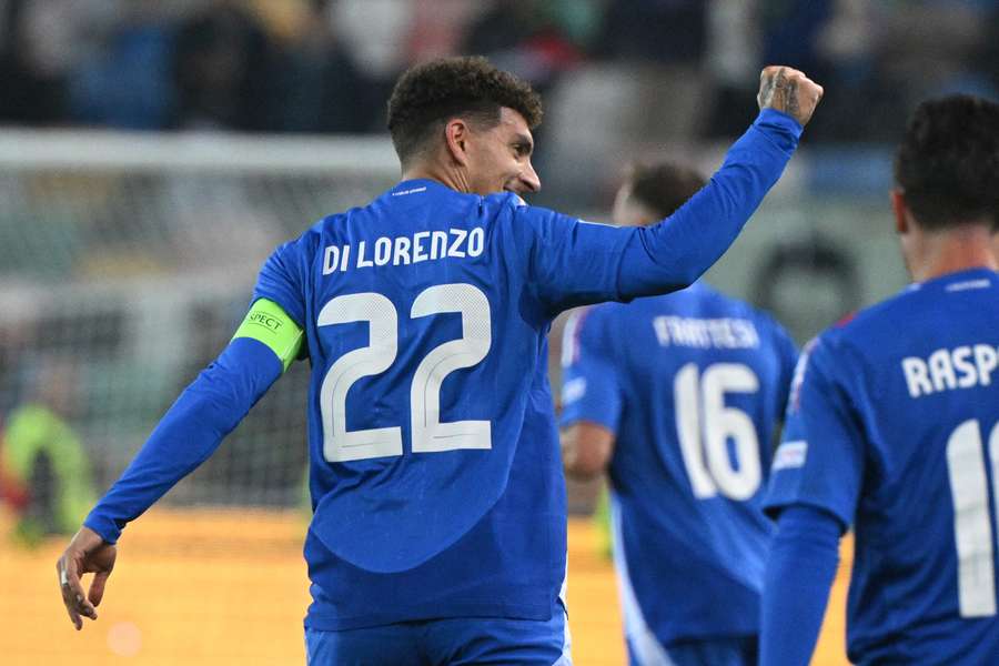 Giovanni Di Lorenzo celebrates scoring for Italy