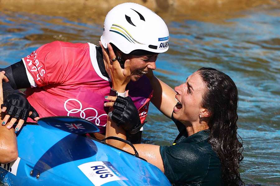 Noemie Fox is congratulated by her sister Jessica after winning gold