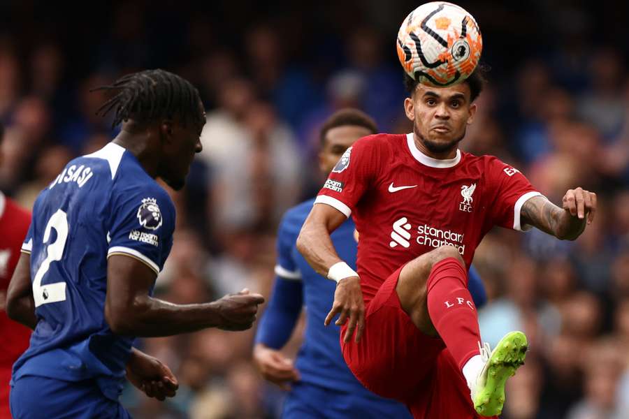 Chelsea's French defender #02 Axel Disasi (L) vies with Liverpool's Colombian midfielder #07 Luis Diaz 