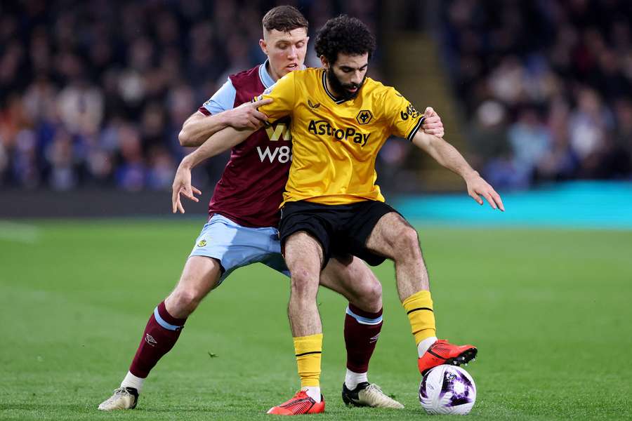Rayan Ait-Nouri of Wolverhampton Wanderers is challenged by Dara O'Shea of Burnley