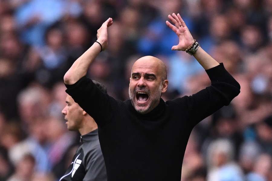 Manchester City's Spanish manager Pep Guardiola gestures on the touchline during the English Premier League football match between Manchester City and Nottingham Forest