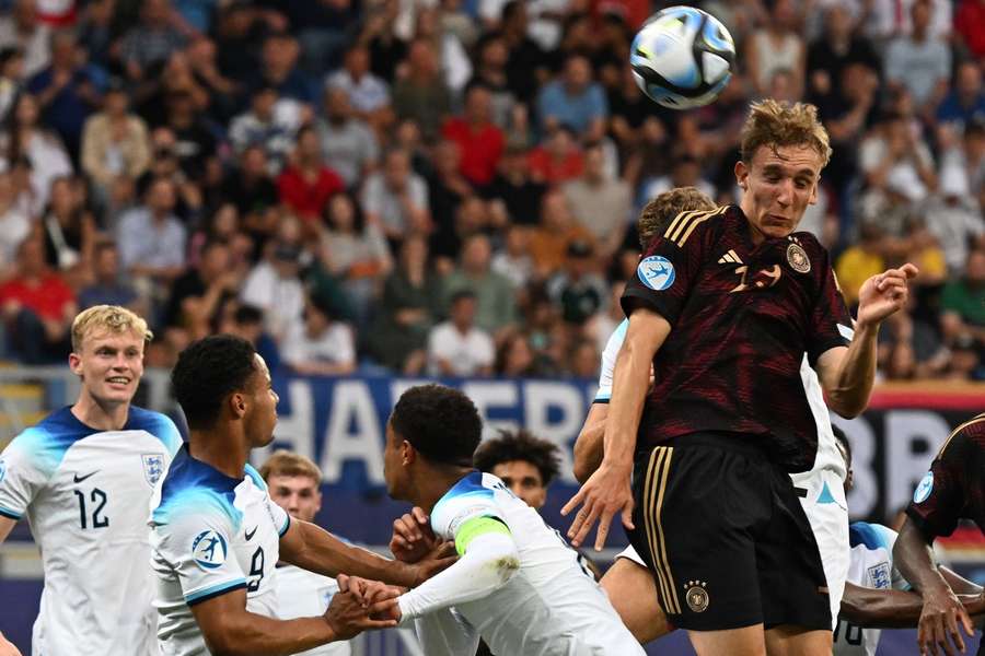 Germany's Nelson Weiper goes for the ball against England