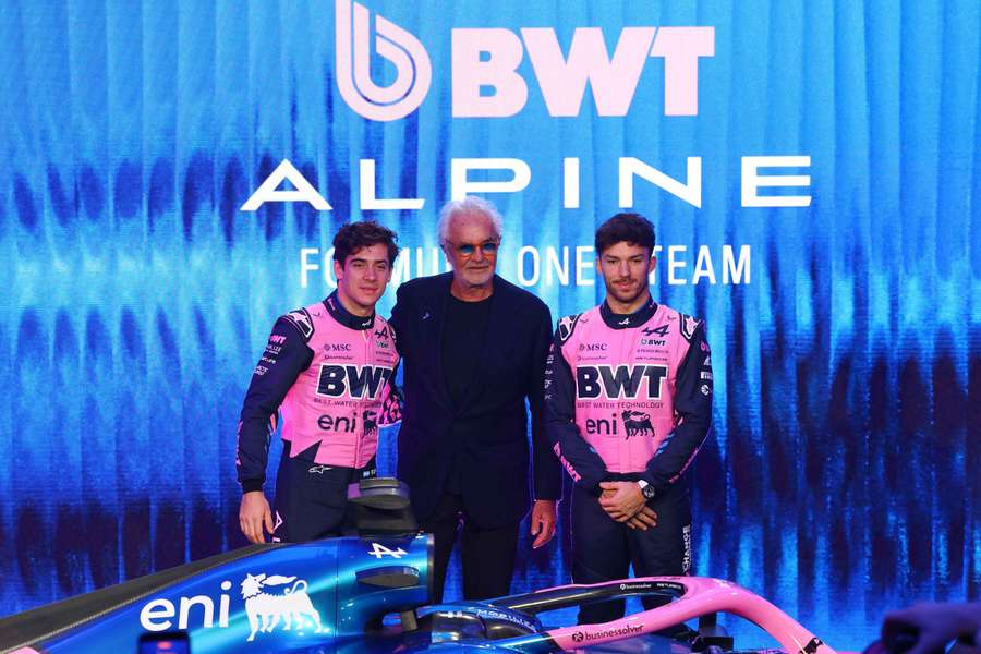Alpine team principal Flavio Briatore and drivers Pierre Gasly and Franco Colapinto pose during the new Alpine F1 car presentation