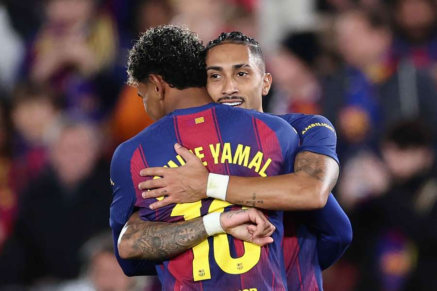 Barcelona's Brazilian forward Raphinha celebrates with Lamine Yamal Barcelona's Brazilian forward Raphinha celebrates with Lamine Yamal