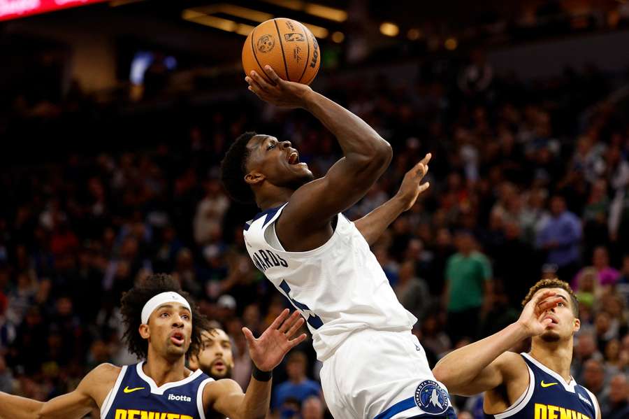 Anthony Edwards of the Minnesota Timberwolves shoots against the Denver Nuggets