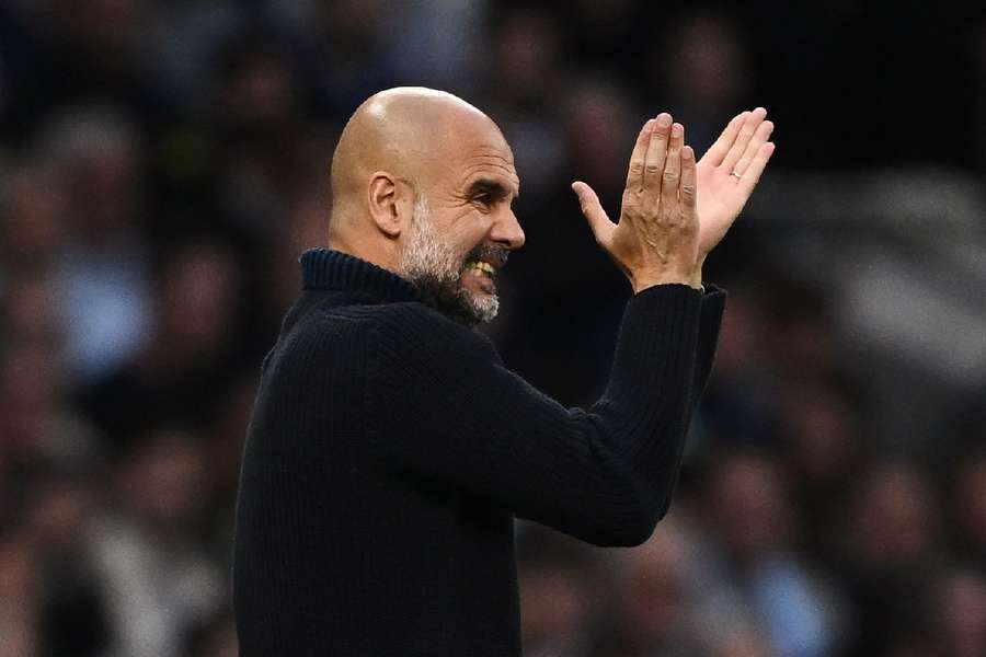 Manchester City's manager Pep Guardiola pushing team on against Tottenham