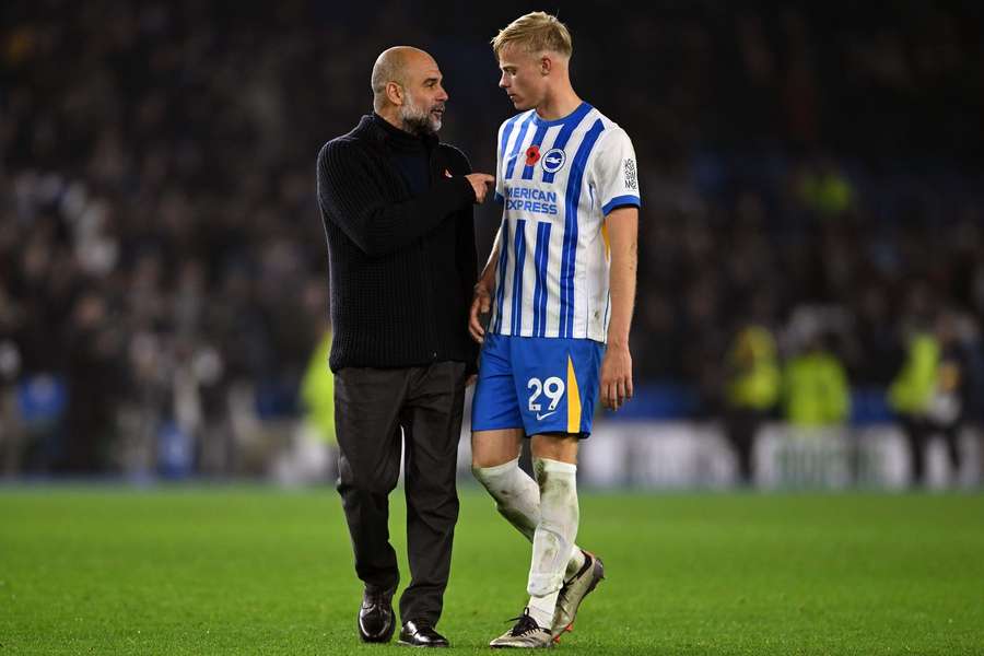 Van Hecke (right) has a heated exchange with Guardiola