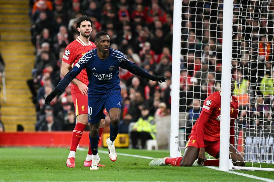 Ousmane Dembélé célèbre l’ouverture du score du PSG face à Liverpool à Anfield en Ligue des champions, le 11 mars 2025.