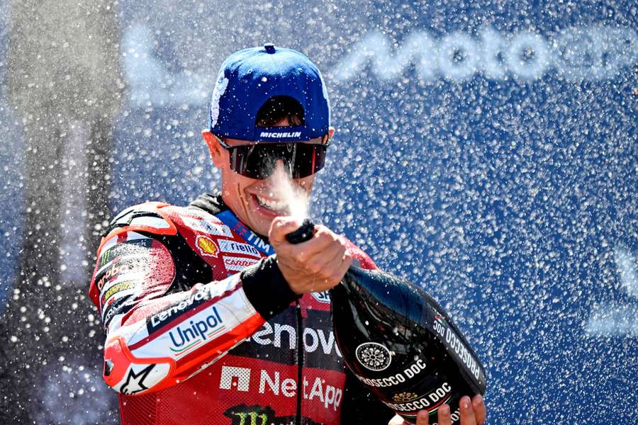 Ducati Lenovo Team's Marc Marquez celebrates on the podium after winning the Aragon Grand Prix