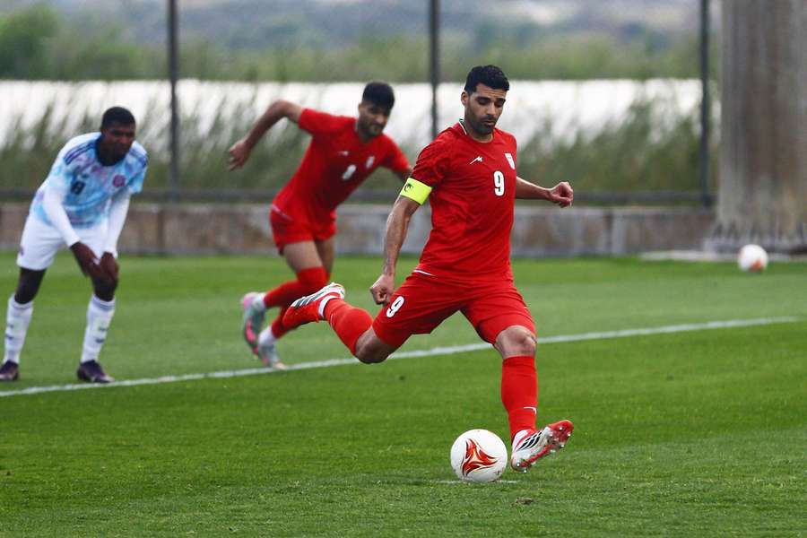 Iran's Mehdi Taremi scores a penalty Iran's Mehdi Taremi scores a penalty