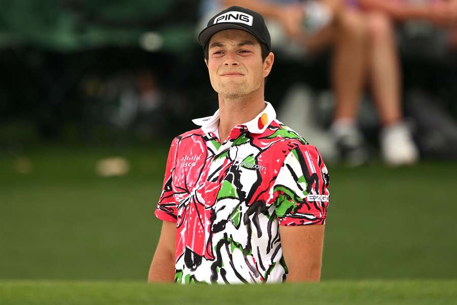 Viktor Hovland looks on from the 18th hole