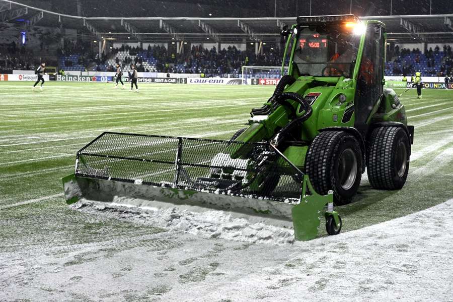 Snow being cleared off the pitch in Helsinki