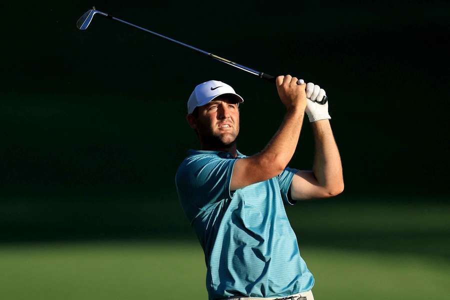 Scottie Scheffler plays his second shot at the 18th hole during Round Three of the 2025 PGA Championship