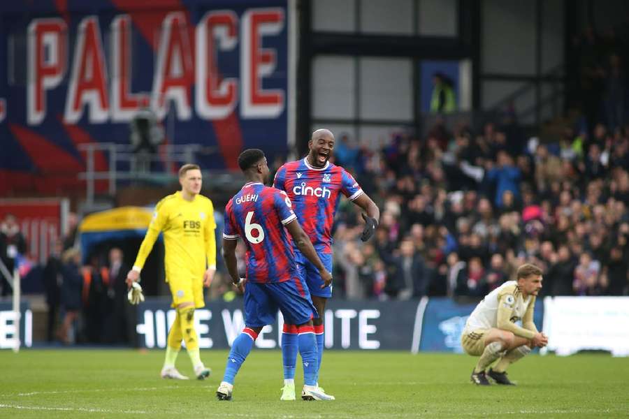 Guehi celebrates with Mateta