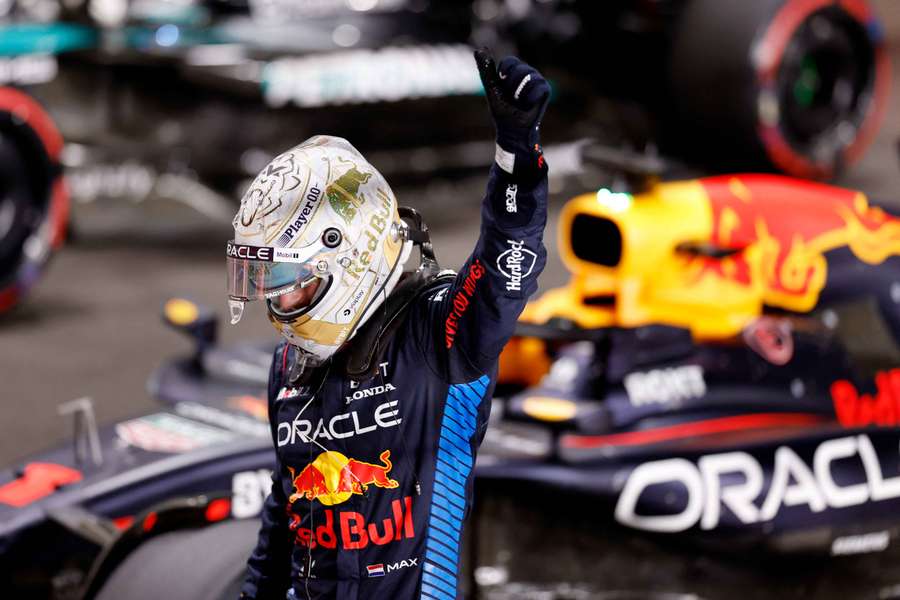 Max Verstappen celebrates after getting on pole, but was later stripped of it