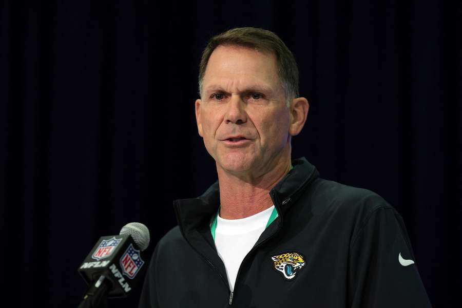 Jacksonville Jaguars general manager Trent Baalke at a podium during the 2024 NFL Combine