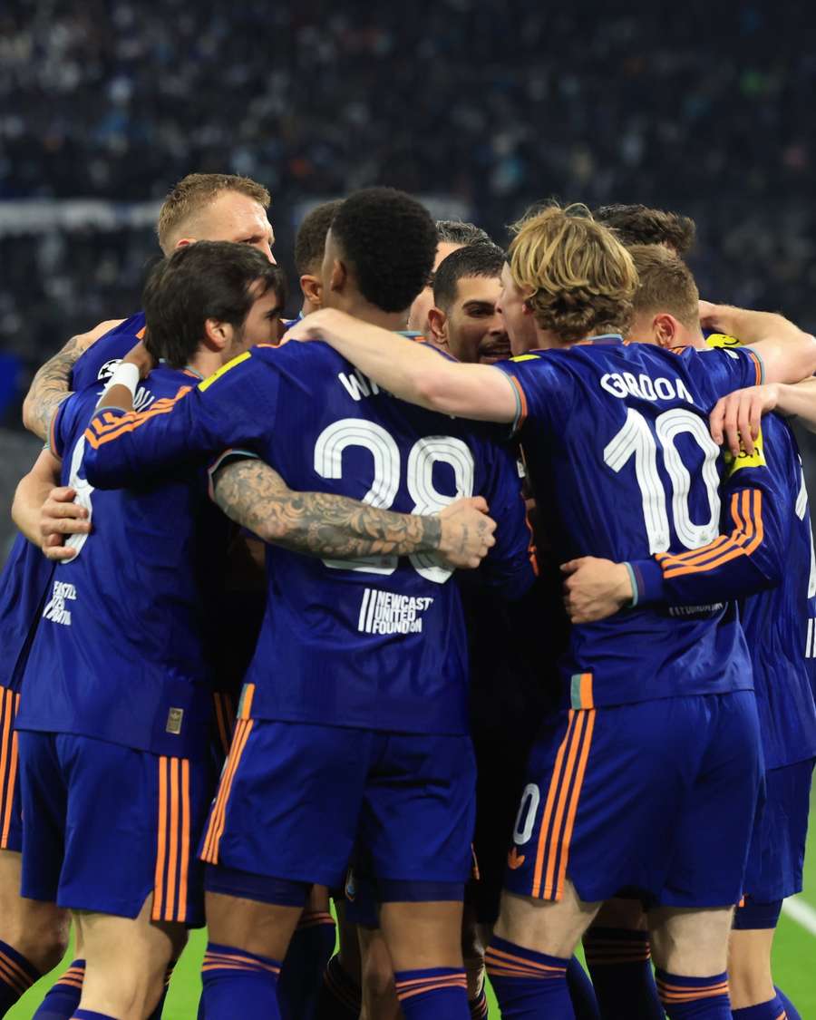 Newcastle celebrate their opening goal