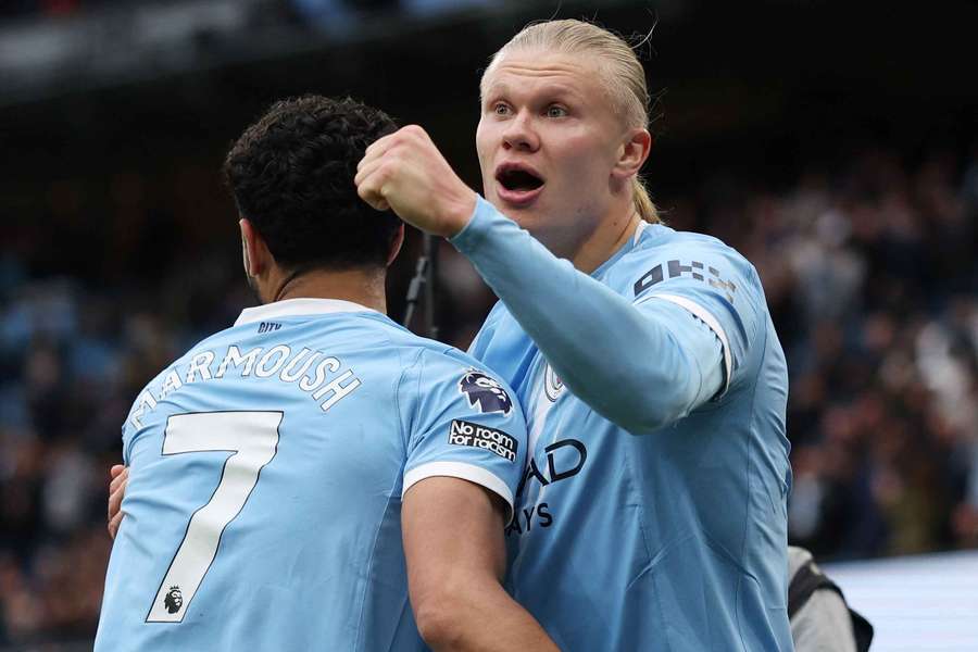 Manchester City's Erling Haaland celebrates scoring their second goal with Omar Marmoush