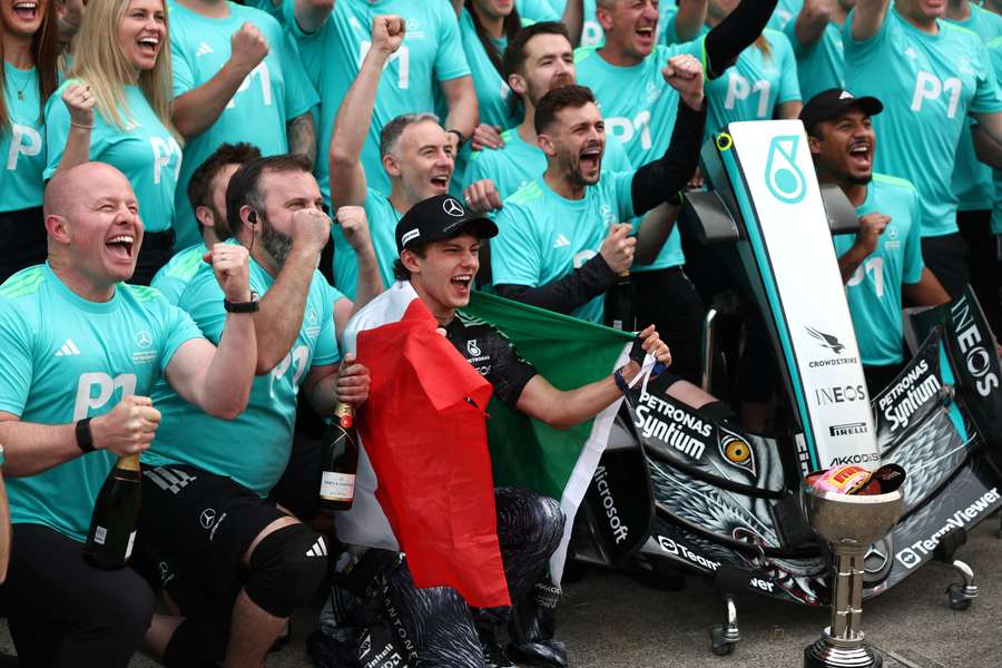 Kimi Antonelli celebrates his win in Japan