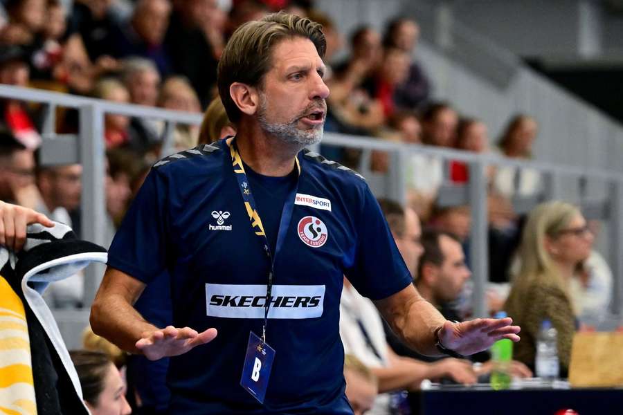 Head coach of Team Esbjerg Tomas Axner tries to direct his team during the game Head coach of Team Esbjerg Tomas Axner tries to direct his team during the game