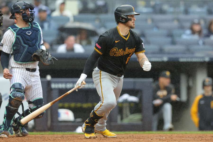 Pittsburgh Pirates catcher Yasmani Grandal follows through on an RBI single against the New York Yankees