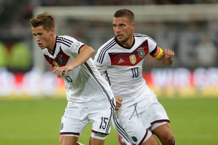 Erik Durk și Lukas Podolski au făcut parte din lotul Germaniei care a câștigat în 2014 Cupa Mondială