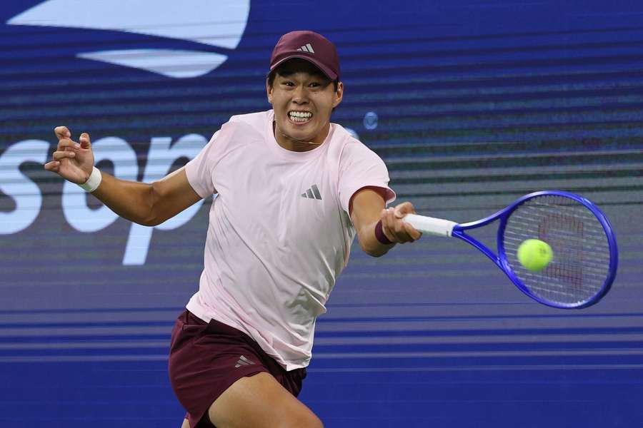 Tien na US Open v utkání s Menšíkem. Tien na US Open v utkání s Menšíkem.