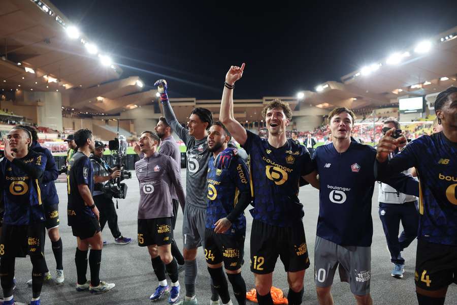 Lille players celebrate after the match