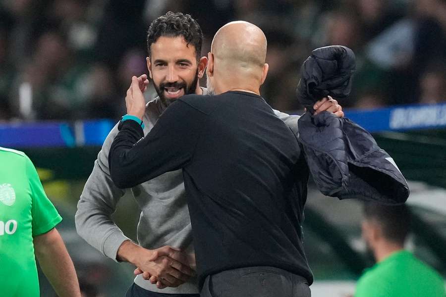 Amorim (L) greets Guardiola (R)