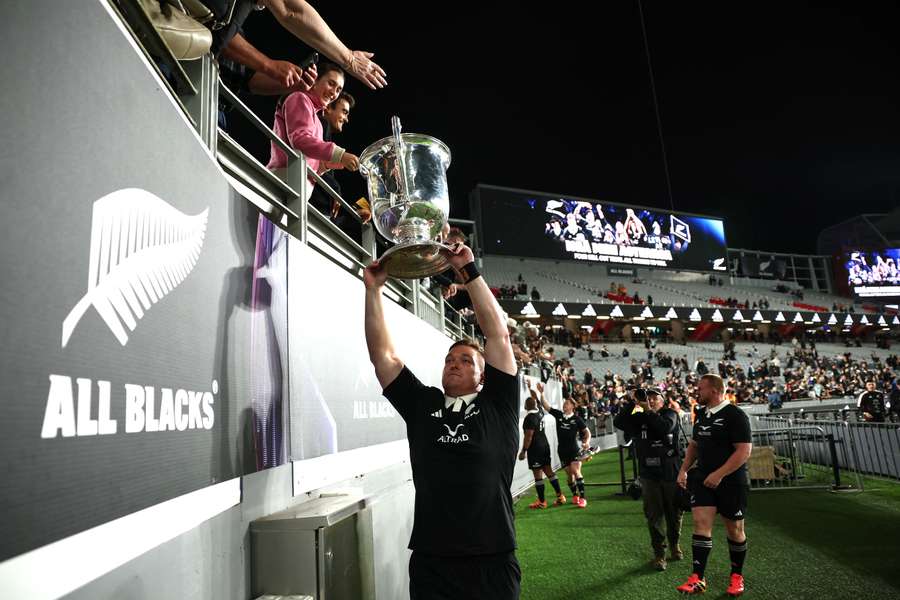 New Zealand's Ethan de Groot sharing the Bledisloe Cup with supporters at Eden Park on Saturday night. New Zealand's Ethan de Groot sharing the Bledisloe Cup with supporters at Eden Park on Saturday night.