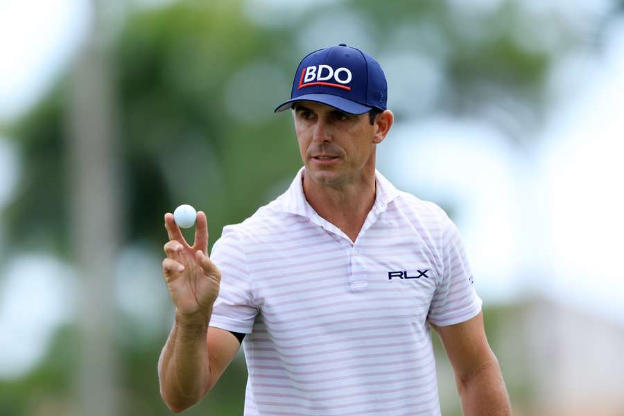 Billy Horschel reacts after making a putt