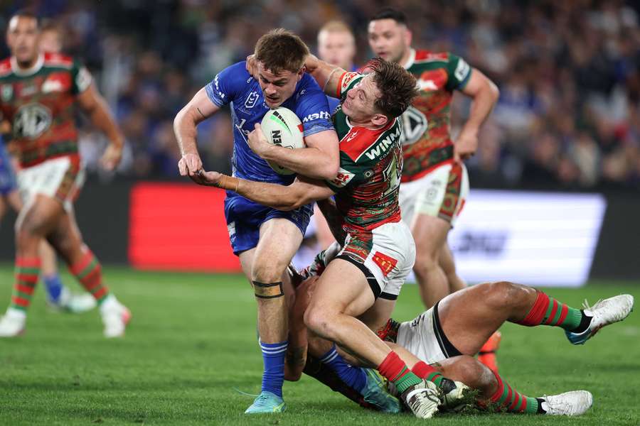 Lachlan Galvin is tackled by Cameron Murray during the Bulldogs' loss to South Sydney.