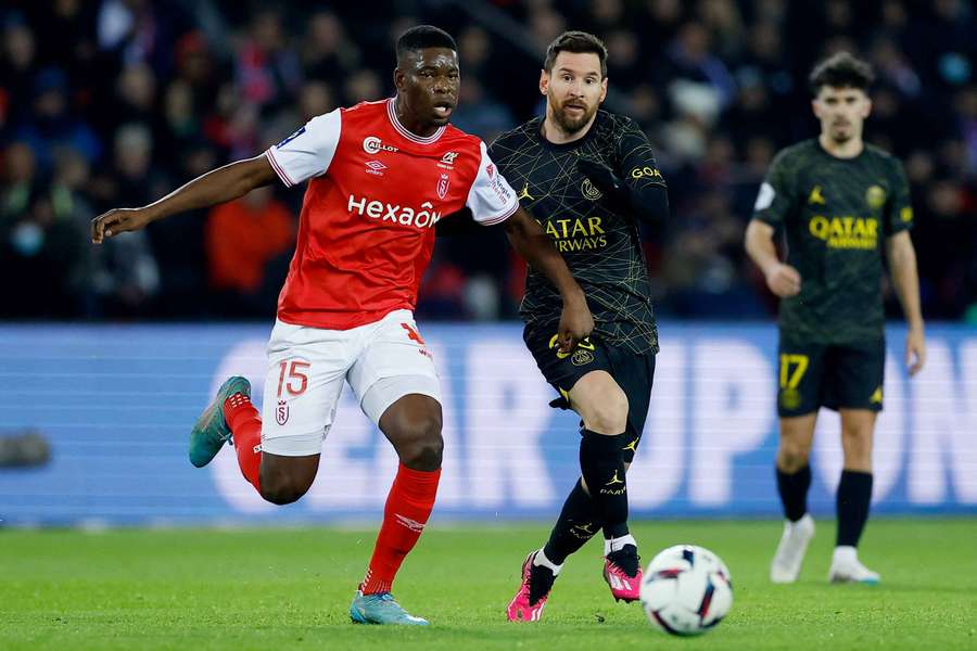 Munetsi (left) in action for Reims