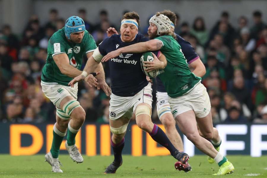 Watson in action against Ireland at the Six Nations last year