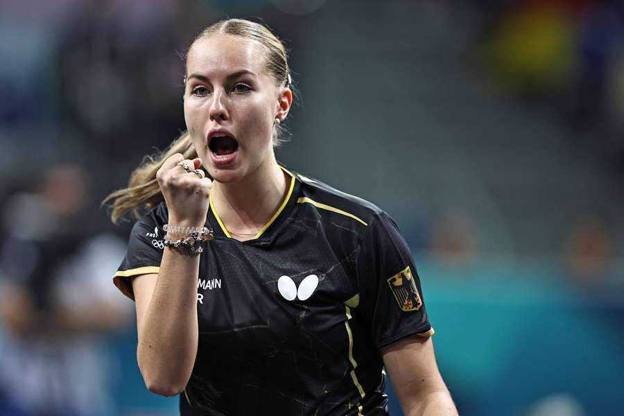 Annett Kaufmann jubelt über Gold.