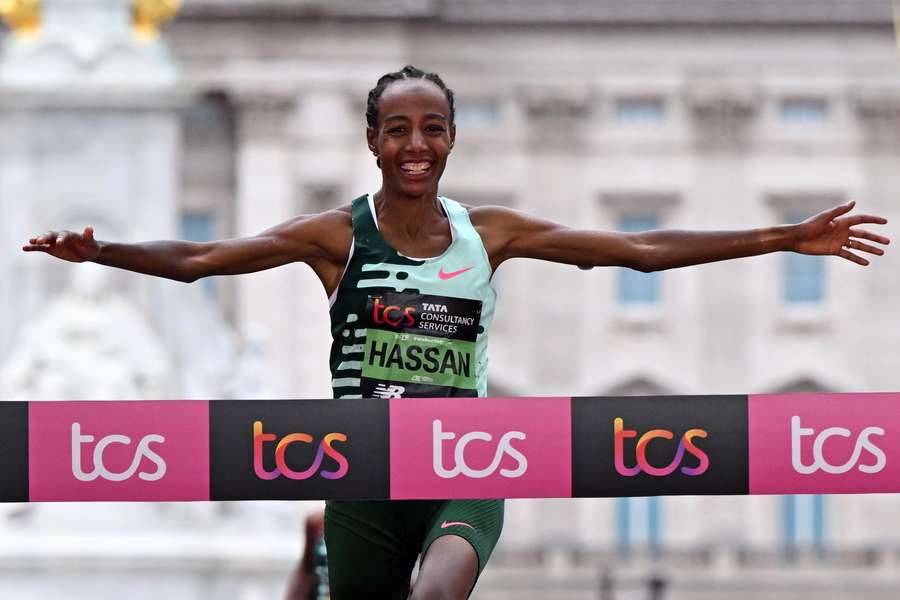 Sifan Hassan crosses the line to win an incredible women's race