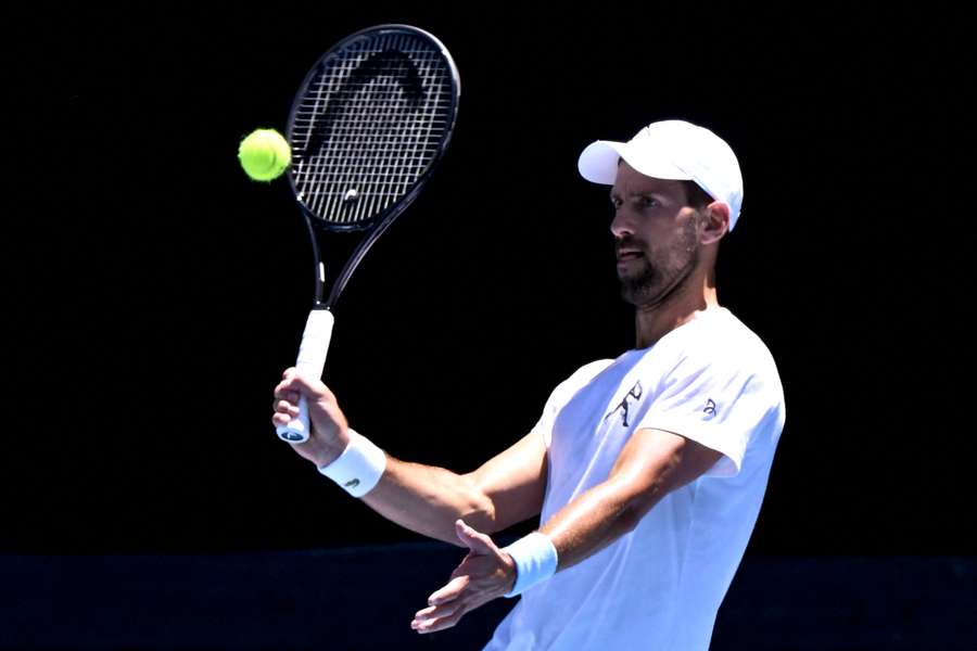 Novak Djokovic hits a return during a training session ahead of the Australian Open