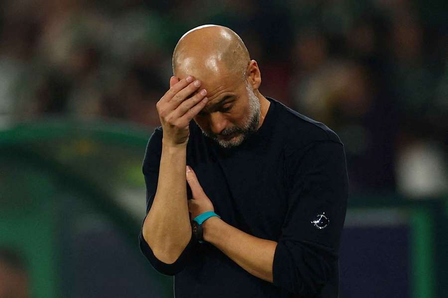 Pep Guardiola looks dejected during a recent Manchester City fixture