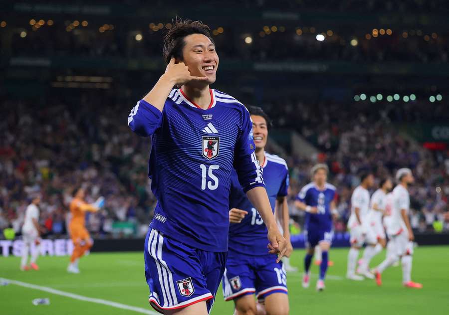 Daichi Kamada celebrate scoring Japan's opening goal